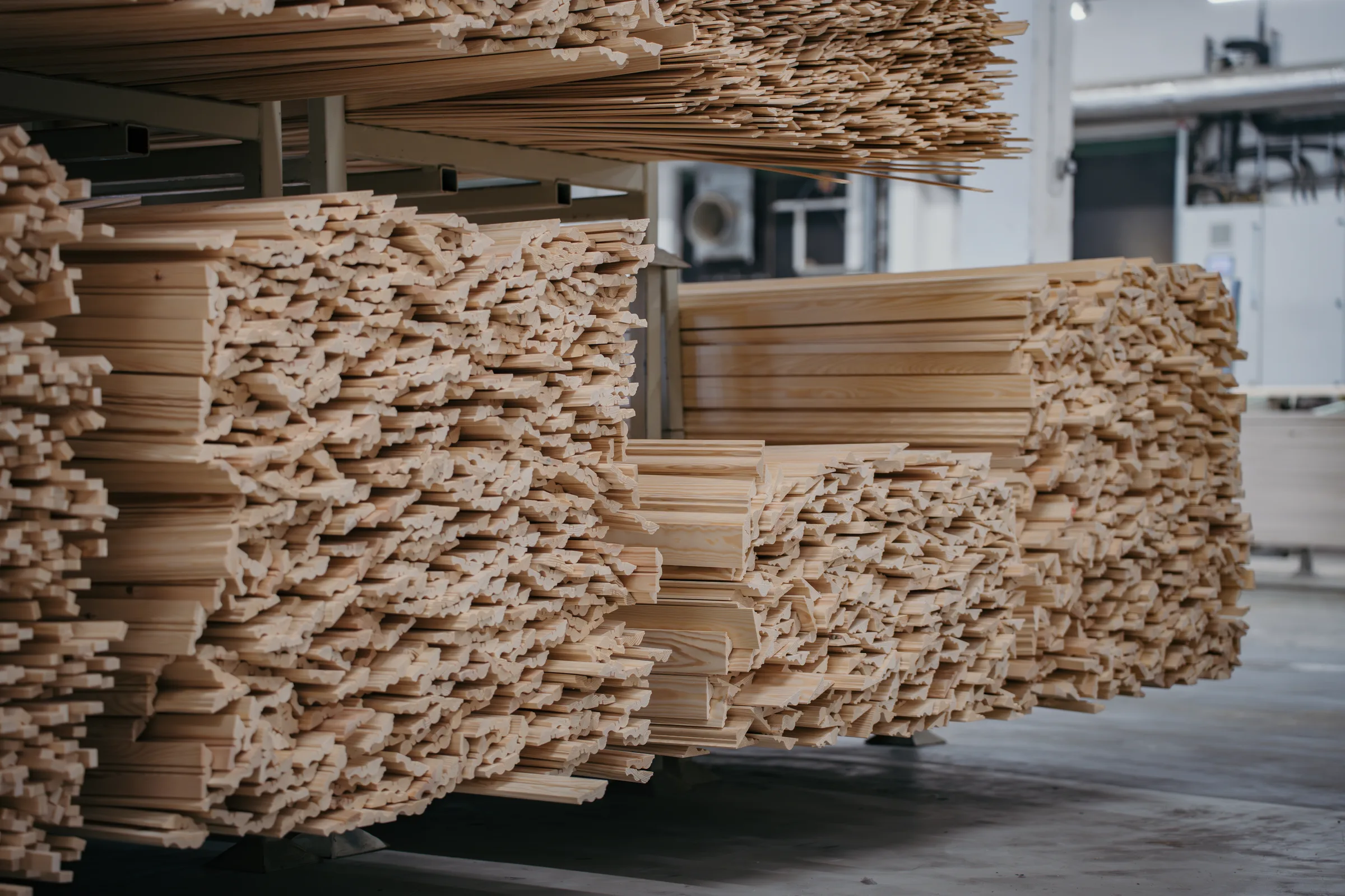 Stacks of profiled wood mouldings in the Combiwood factory